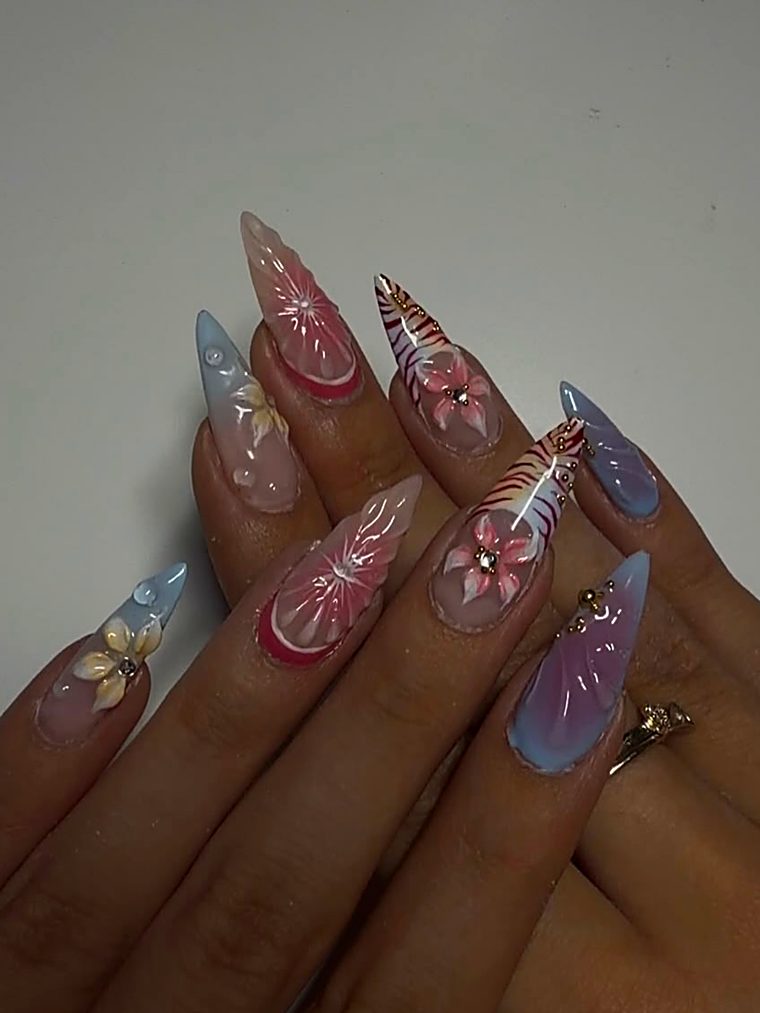 Long stiletto nails with 3D flowers in pastel gradients